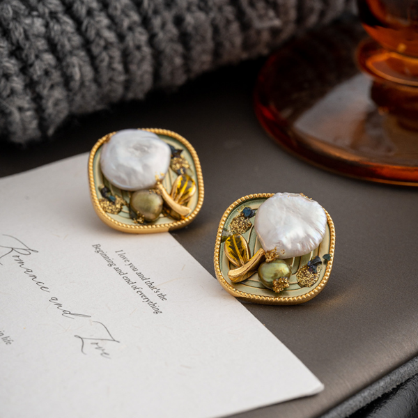 Natural Baroque Pearls Oil Painting Style Vintage Earrings, green color, the earrings are made of natural white freshwater pearls, one leaf is made of green natural pearls, and the other one is made of alloy gold.