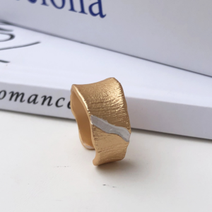 Vintage Brushed Colour Clash Open End Ring, golden color, there is a diagonal metal color line on the surface