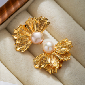 Natural pearl French floral textured earrings, golden and silver color, fan shape. The earrings have a natural freshwater pearl set in the center, and the left and right earrings each have the shape of a half-flower made of alloy, available in gold and silver color.